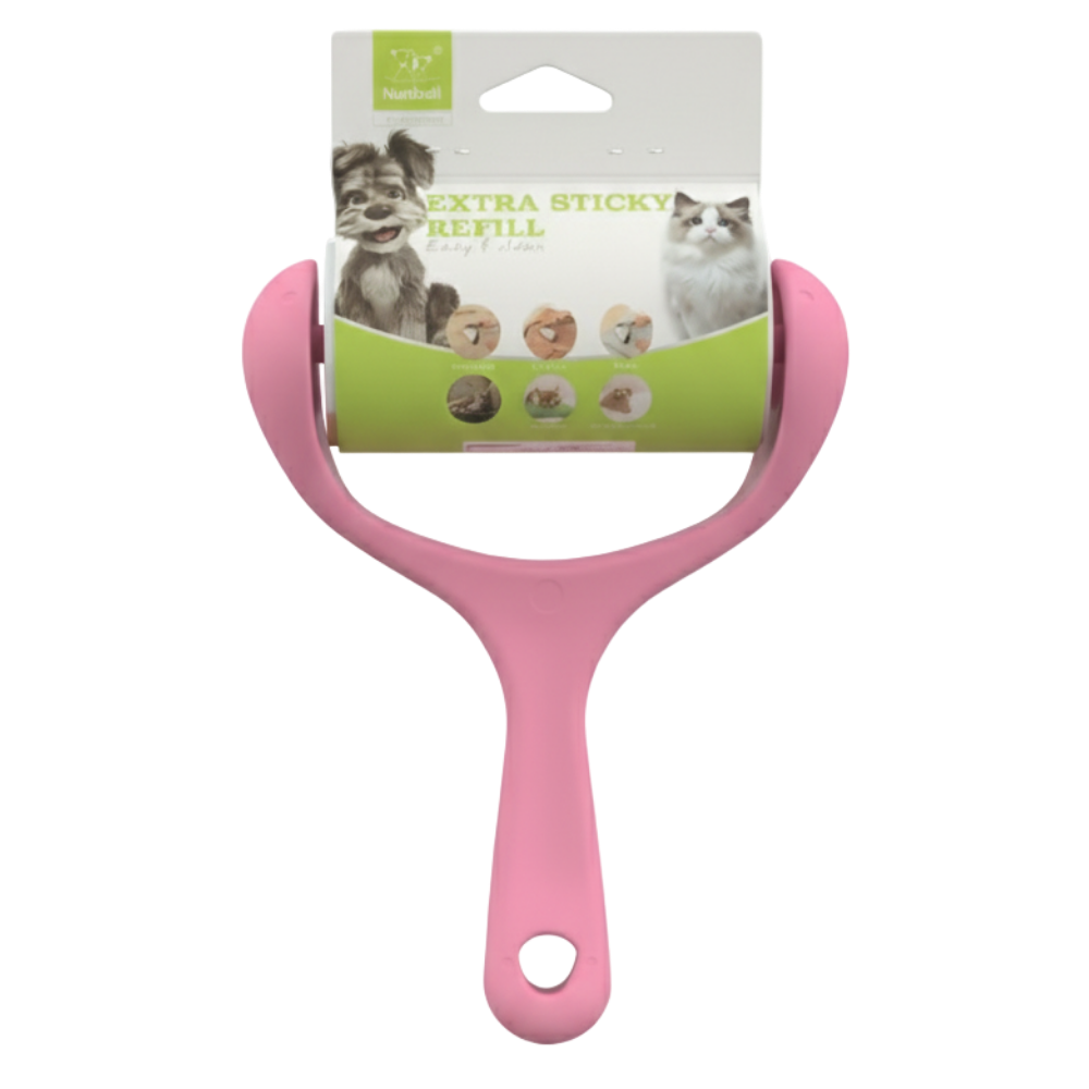 Pink pet grooming tool with a label on a white background