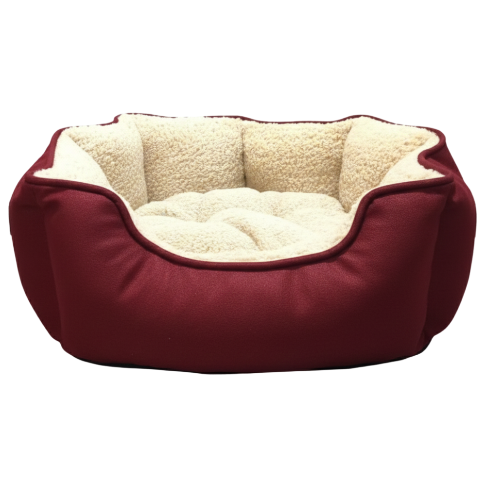 Red pet bed with beige interior on a light gray background