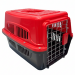 Red and black pet carrier on a white background