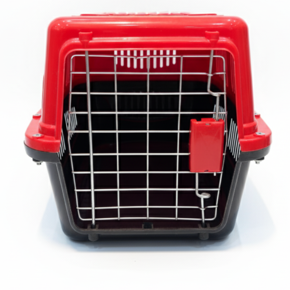 Red and black pet carrier on a white background