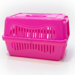 Pink pet carrier on a white background