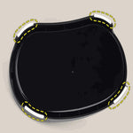 Black plastic tray with white handles on a beige background