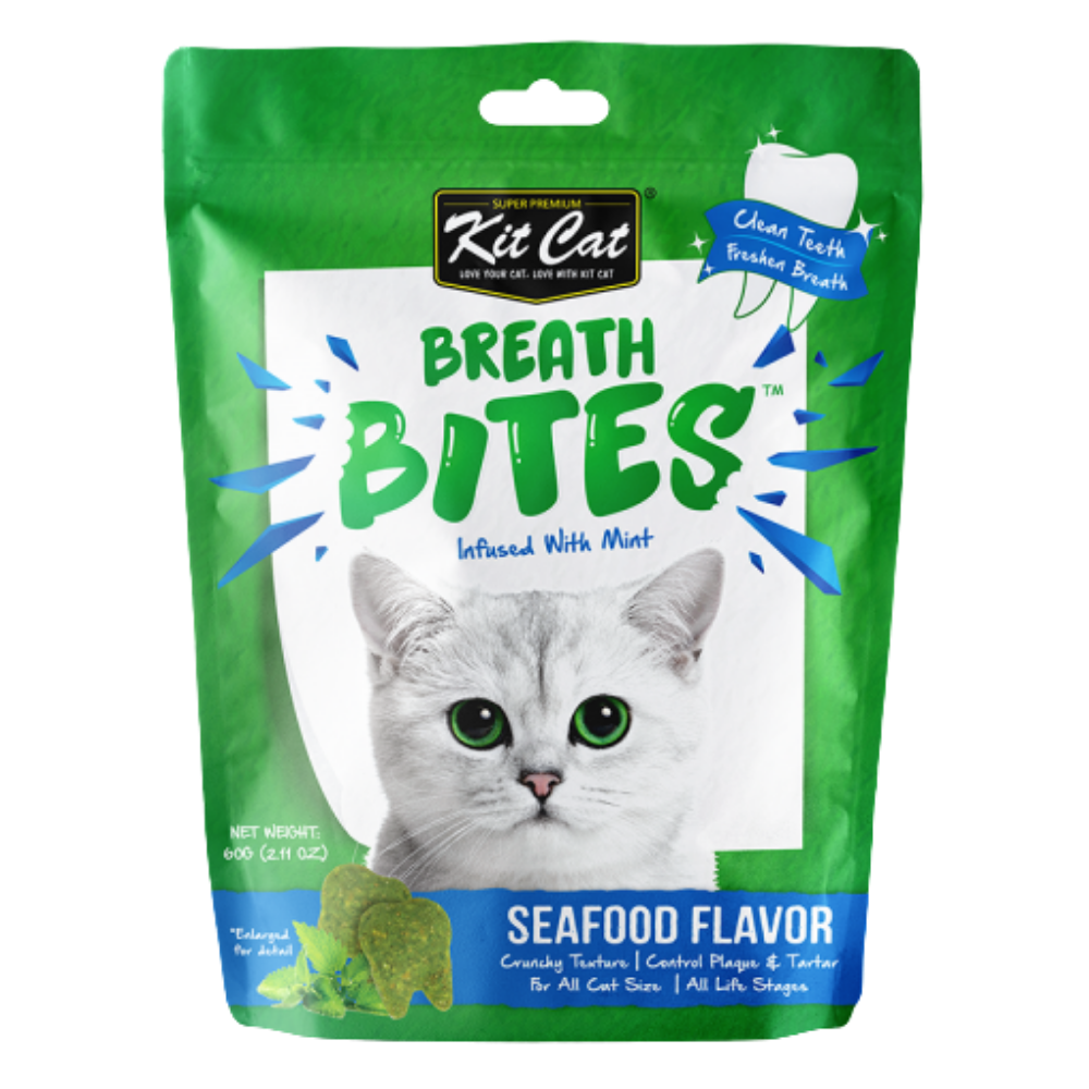 Green package of Kit Cat Breath Bites for cats on a white background