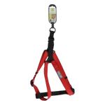Red dog harness with black straps on a white background