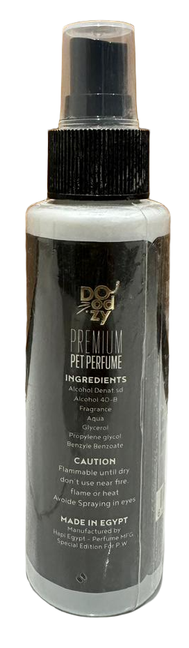 Spray bottle with black and white label on a tiled floor with wooden wall background