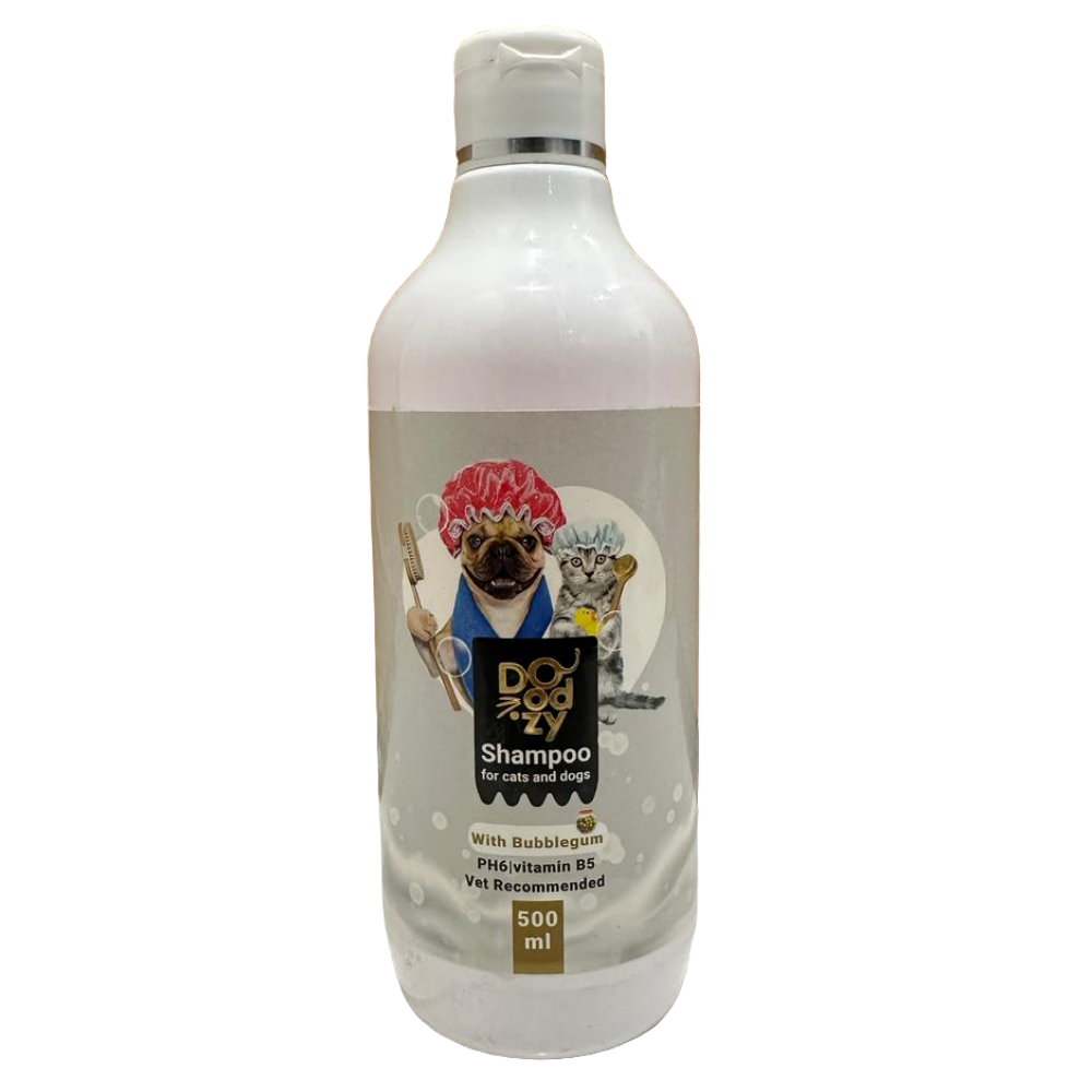 Dog shampoo bottle with a label featuring cartoon dogs on a wooden surface.