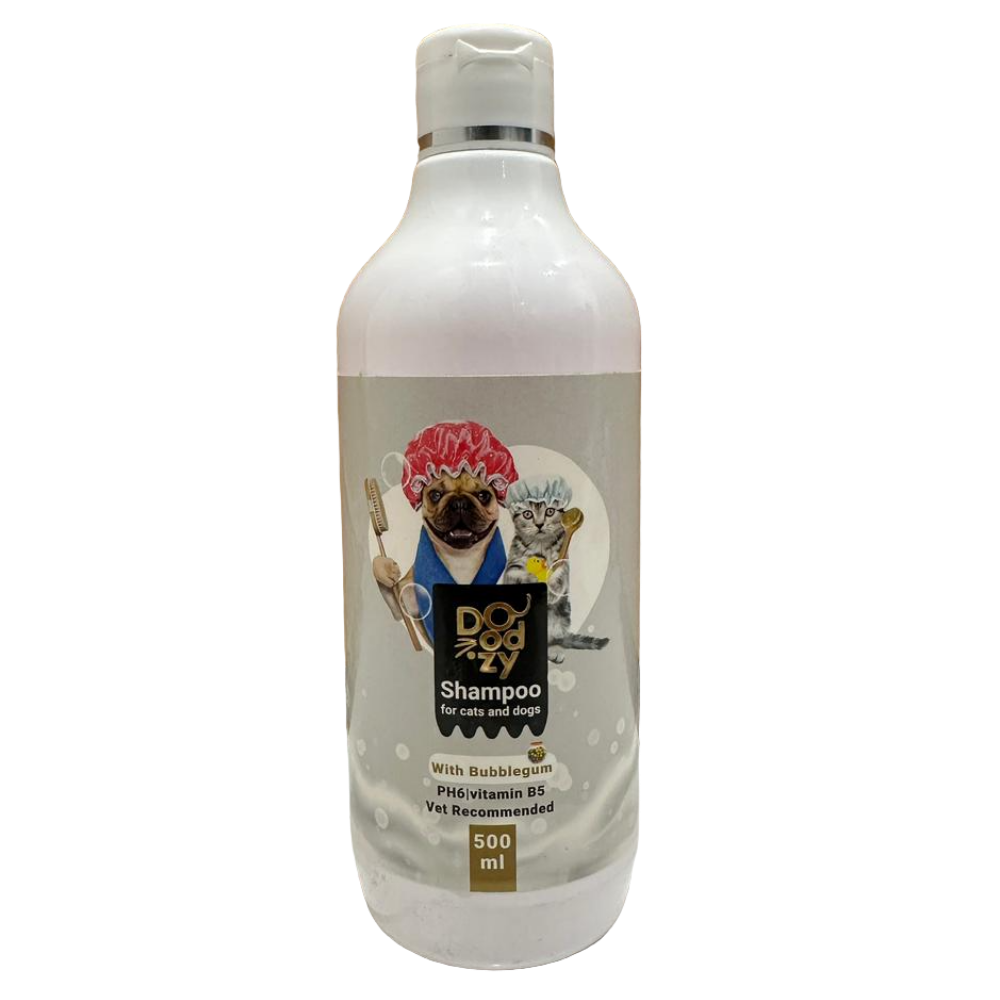 Dog shampoo bottle with a label featuring cartoon dogs on a wooden surface.