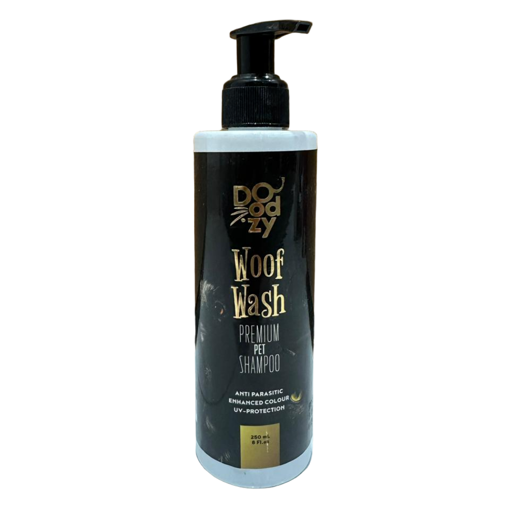 Doggy Woof Wash premium pet shampoo bottle on a tiled floor with wooden wall background