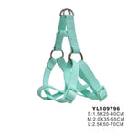 Mint green dog harness on a white background with size information.