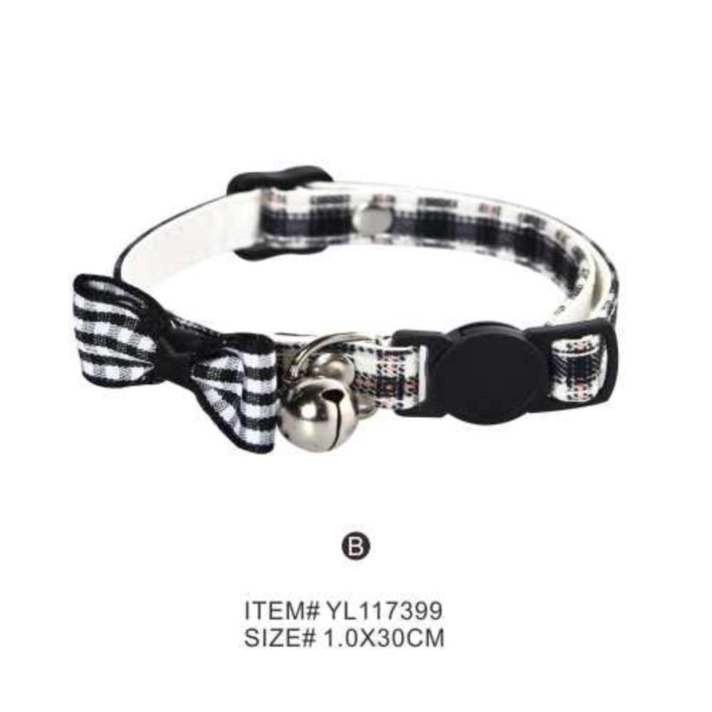 Pet collar with bow and bell on a white background
