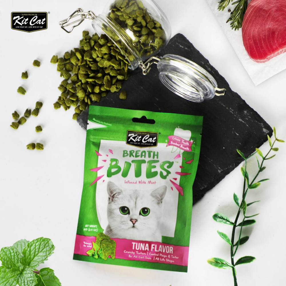 Kit Cat Breath Bites tuna flavor cat treat package with green treats on a white background