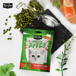 Kit Cat Breath Bites salmon flavor cat treat package with green herbs on a white background