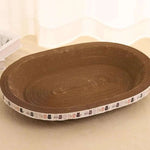 Catnip toy with corrugated design on a beige surface