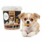 Chihuahua puppy eating Rich Excellence beef biscuit treat
