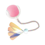 Silicone tool with pink top and multicolored handle on a white background