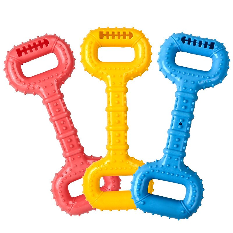Three colorful dog toys shaped like bones on a white background