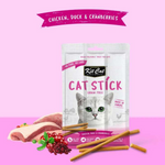 Kit Cat Cat Stick package with cat illustration on pink background