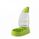 Green pet feeder with clear water container on a white background