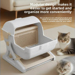 Cat litter box with modular design and two cats on a wooden floor.