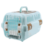 Pet carrier with a light blue exterior and brown accents on a white background