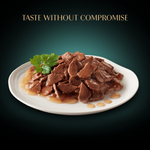 Plated dish of cooked meat with a dark background and text 'Taste Without Compromise'.