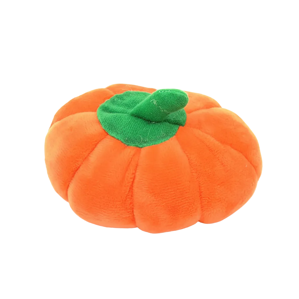 Orange plush pumpkin dog toy white background