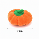 Orange pumpkin toy with 9cm width measurement