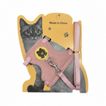 Pink cat harness on white background