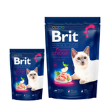 Two packages of Brit cat food with a white background