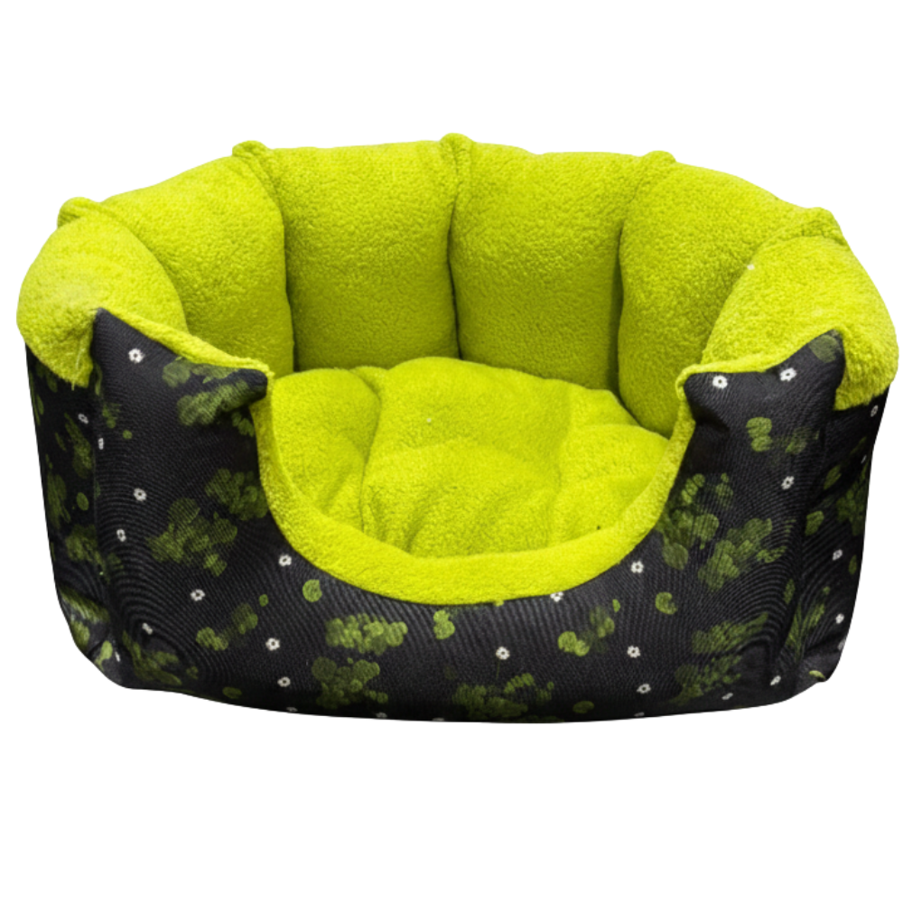 Green pet bed with black patterned exterior on a white background