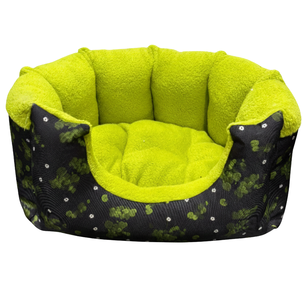 Green pet bed with black patterned exterior on a white background