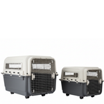 Two pet crates, one larger and one smaller, on a white background