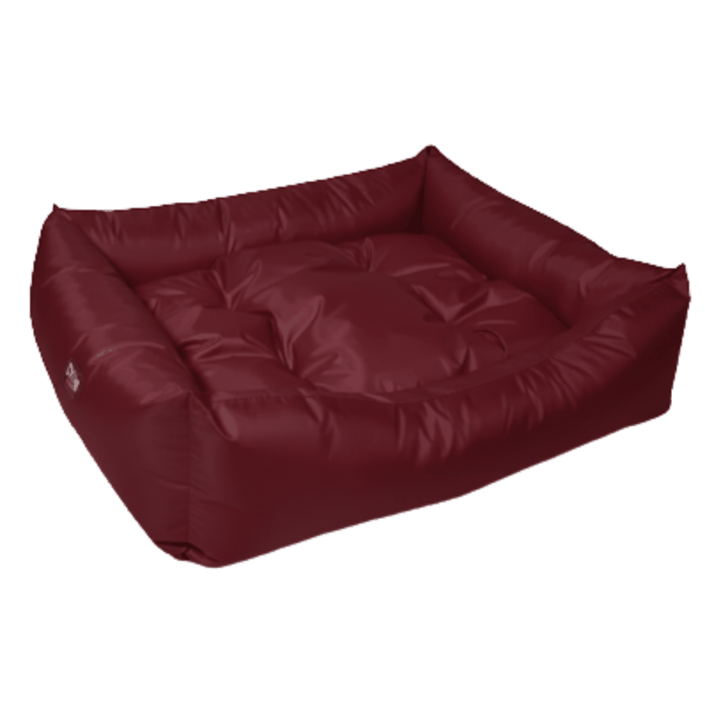 Maroon dog bed on a white background