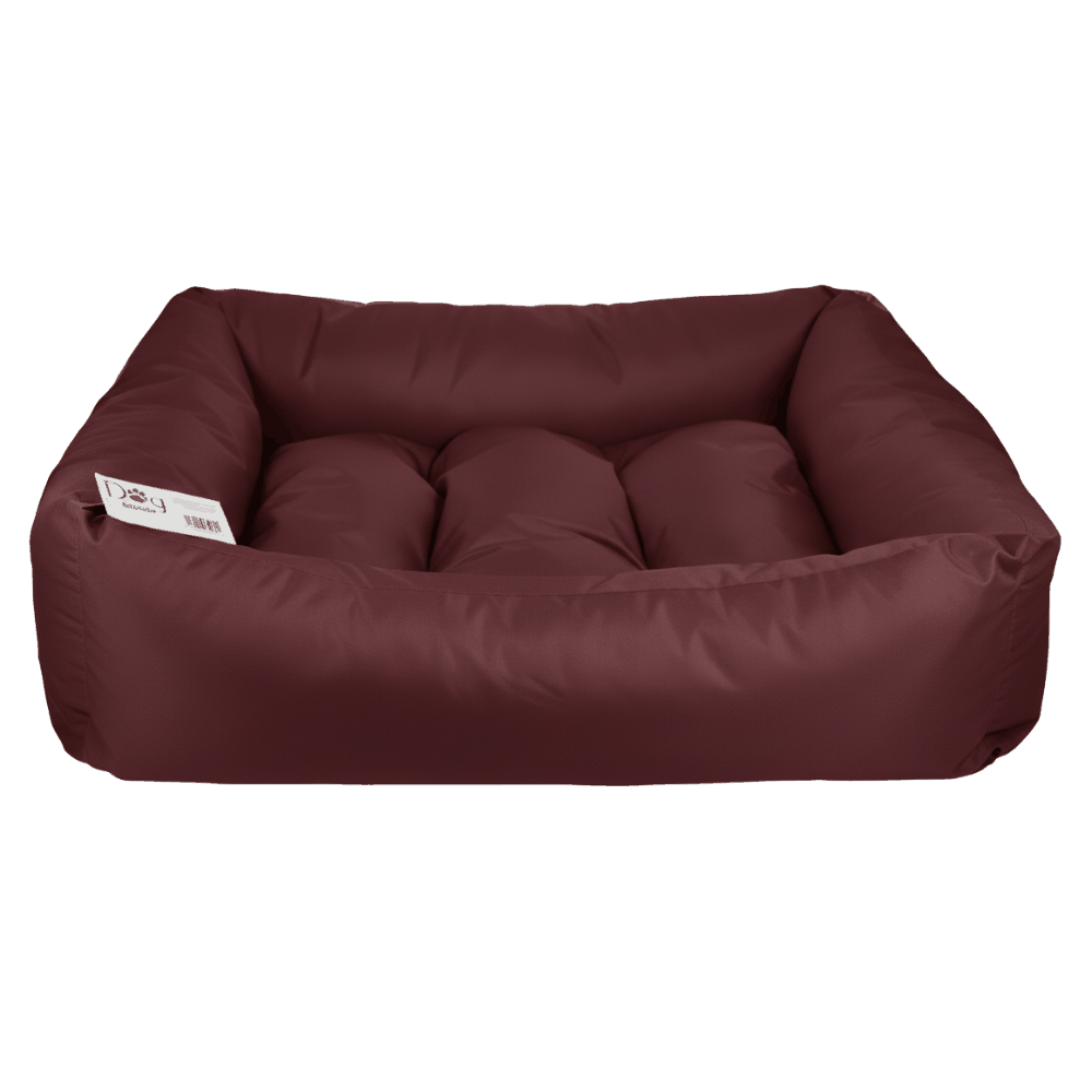 Maroon dog bed on a white background