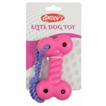 Pink dog toy with a purple rope on a Groovy branded packaging