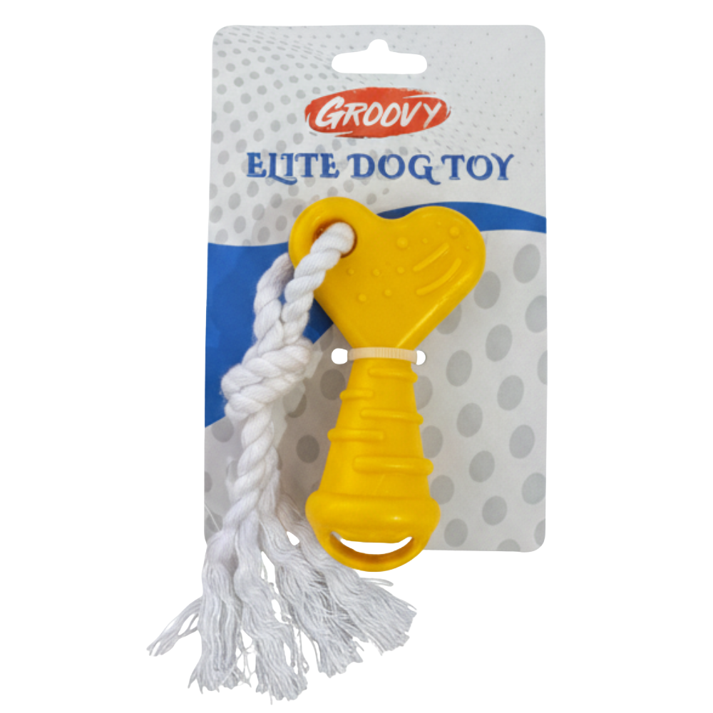 Yellow dog toy with white rope on a Groovy branded packaging