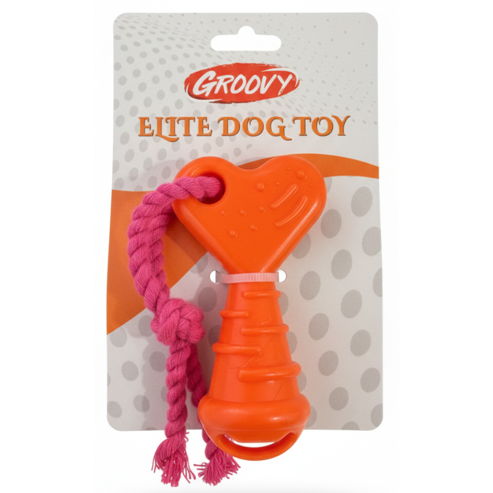 Orange dog toy with pink rope on a Groovy branded package
