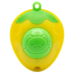 Yellow and green avocado-shaped toy with a cat face on a white background