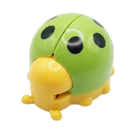 Green and yellow ladybug-shaped object on a white background