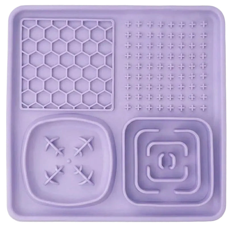 Purple silicone mat with various patterns on a white background