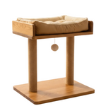Wooden cat tree with a platform and hanging toy on a white background